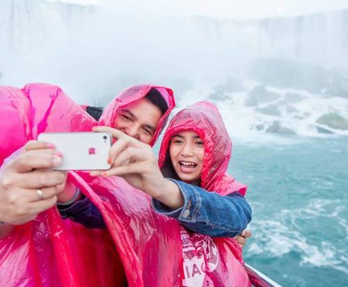 Passengers take photos