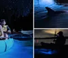 Two people are kayaking at night on a bioluminescent bay under a starry sky