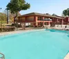 Outdoor Swimming Pool of Days Inn by Wyndham Pensacola West