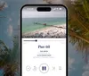 The image shows a smartphone displaying a video of a crowded beach and pier titled Pier 60 by EAR LENPIN framed by palm leaves in the foreground suggesting a tropical setting
