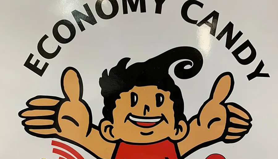 The image shows a cartoon character with two thumbs up below the words ECONOMY CANDY.
