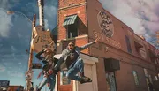A person is joyfully jumping in front of Sun Studio, which is known as the birthplace of rock'n'roll, with a large guitar sign above.