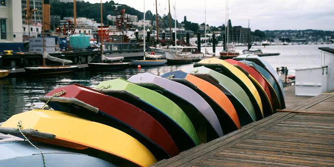 row boats stacked in a line