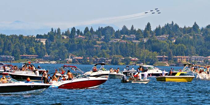 lot of ski boats on water