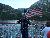 Pic with the Flag with the M.S. Dixie II Sightseeing and Sunset Dinner Cruises