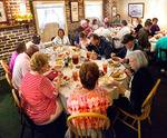 Group eating lunch at Mrs. Wilkes' Dining Room Group eating lunch at Mrs. Wilkes' Dining Room