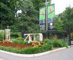 Outside view of zoo and sign Outside view of zoo and sign