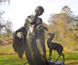 Woman and deer statue