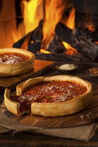 Try a slice of deep dish pizza at Uno's