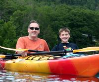 Father and Son with Wisconsin Dells Kayaking and Paddleboarding Adventure Tours