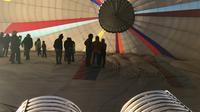 Walk inside the hot air balloon as it inflates.