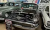 A classic black 1955 Oldsmobile 