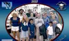 A group of people is gathered at the Crazy Sister Marina in Murrells Inlet, SC, posing for a photo in front of a boat.