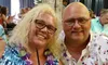Couple with a Coconut Drink at the Polynesian Luau and Fire Dinner Show at St Johns Inn