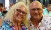 Couple with a Coconut Drink at the Polynesian Luau and Fire Dinner Show at St Johns Inn