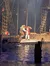 Performers in pirate costumes appear to be enacting a scene on a ship-themed stage with a body of water in the foreground.