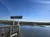 The image shows a marina sign labeled