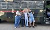 The Redneck Comedy Bus Tour Pigeon Forge - couple photo with tour guides.