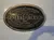 The image displays a commemorative plaque for the