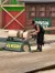 A person is operating a chainsaw to cut through a log, likely at an outdoor lumberjack show or competition.