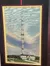 The image depicts a vintage postcard showcasing WSM, America's tallest radio tower at 878 feet in Nashville, Tennessee, which is 323 feet higher than the Washington Monument.
