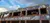 The image shows the exterior of the Grand Ole Opry House with a