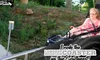A person is riding a mountain coaster at SkyLand Ranch, advertised as the longest in the Southeast, with the coaster's logo and slogan visible.