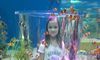 Girl with Clown Fish at Ripleys Aquarium of the Smokies
