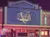 The image shows a brightly lit exterior of the 