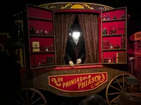 The image depicts a vintage-style medicine wagon with the label 