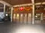 The image shows the entrance of the Grand Ole Opry House, decorated with colorful garlands and a