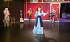 The image depicts lifelike figures of musicians on a stage set resembling the Grand Ole Opry, with a woman in a blue dress in the foreground holding a microphone.