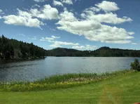 Beautiful Lake with the Mount Rushmore and Black Hills Tour