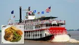 A red and white paddlewheel steamboat adorned with American flags cruises on a river, churning water with its iconic red wheel.