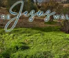 The image shows a lush green landscape with the text Where Jesus Walked overlaid on top