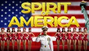 The image features a group of performers in red costumes and a naval officer in front of an American flag backdrop with the text 