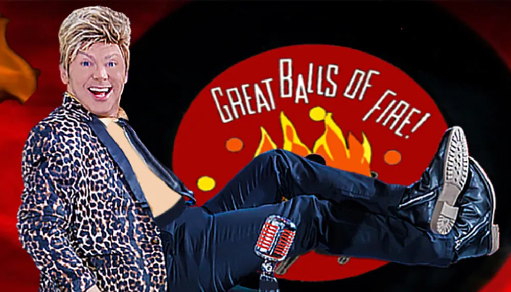 A person in a leopard print jacket poses energetically in front of a stylized Great Balls of Fire background with flames and a microphone