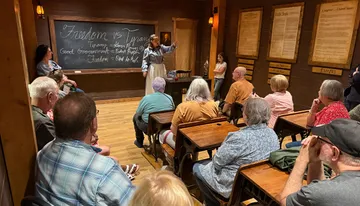 A person is giving a lecture about 