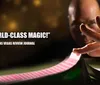 A person skillfully fans a deck of cards accompanied by a glowing review saying World-Class Magic from the Las Vegas Review Journal