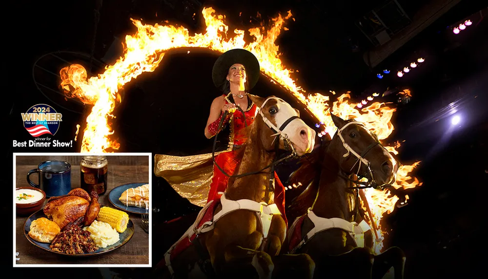 A performer rides two horses through a flaming ring in a dramatic lit-up setting