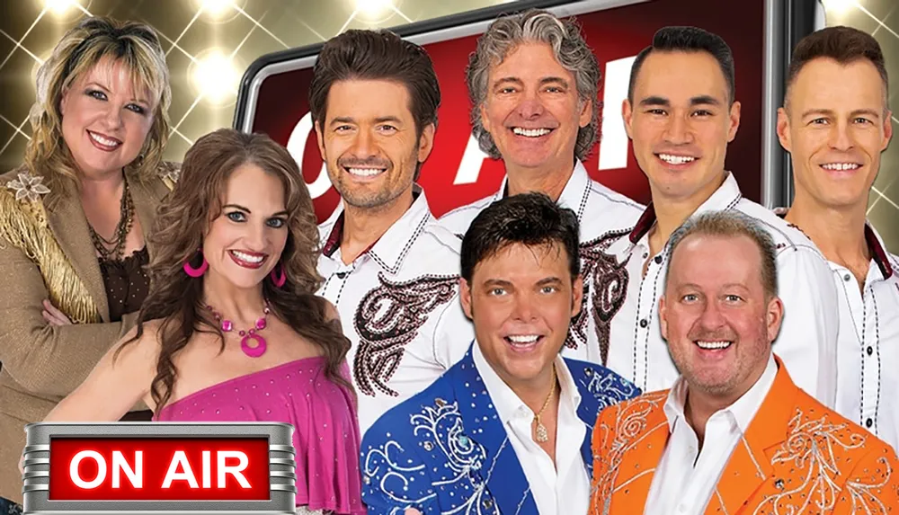 This image features a group of eight smiling people in colorful clothing posed together with an As Seen on TV graphic suggesting they might be part of a television show or advertisement
