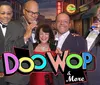 The image features a group of five people four men in suits and a woman in a red dress holding microphones in front of a backdrop of a street scene with colorful text reading Doo Wop  More overlaying the bottom