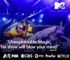 The image shows a staged performance featuring a helicopter and performers under dramatic lighting with a quote praising the shows magic and logos from various media outlets including MTV Hulu and Netflix