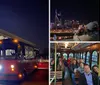 The image shows a red and green trolley-style bus parked on a city street at twilight with buildings and street lights visible in the background