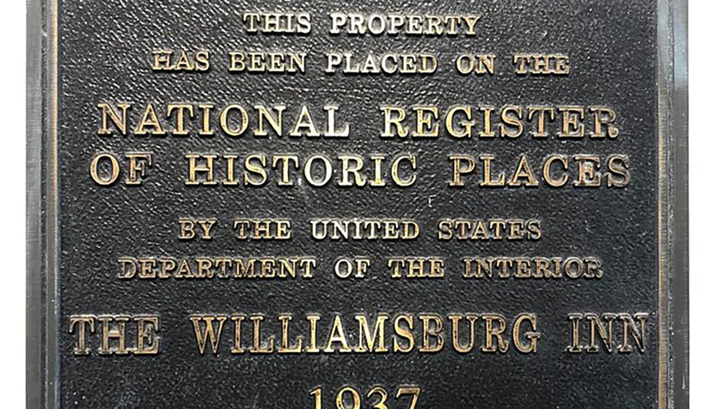 The image shows a plaque stating that the property The Williamsburg Inn has been placed on the National Register of Historic Places by the United States Department of the Interior in 1937