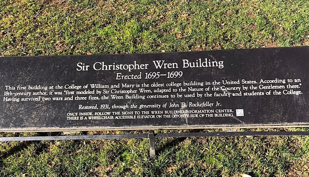 The image shows an informational plaque for the Sir Christopher Wren Building at the College of William and Mary detailing its history and restoration