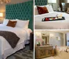 A stylishly decorated bedroom features a large bed with a tufted emerald headboard eclectic furnishings and a warm lighting scheme