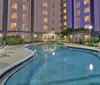 Outdoor Swimming Pool of La Quinta Inn  Suites by Wyndham Orlando