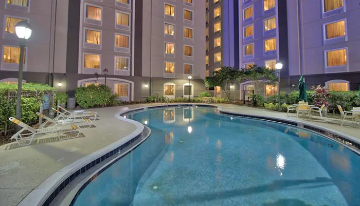 Outdoor Swimming Pool of La Quinta Inn  Suites by Wyndham Orlando