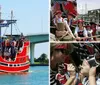 A red and black pirate-themed tour boat named Pirates Ransom is navigating a waterway with people on board with a bridge and palm trees in the background